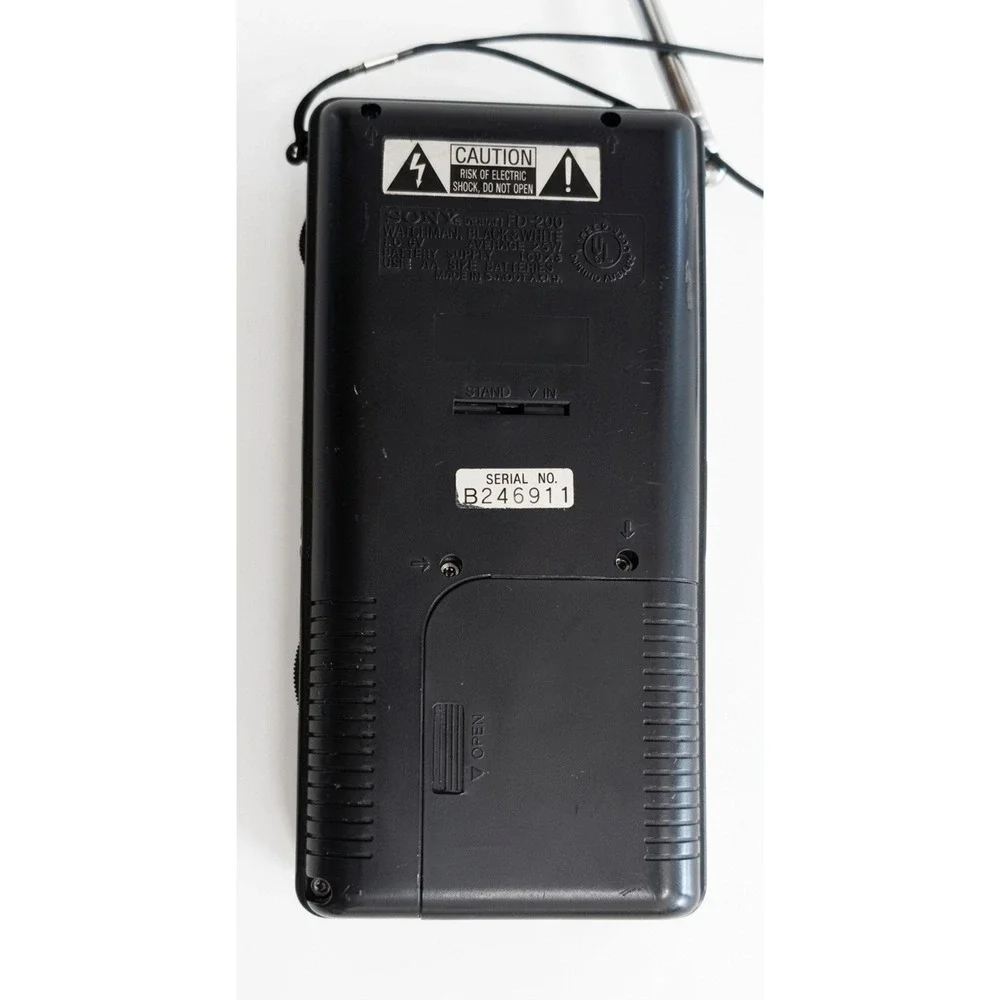 Sony Watchman Model FD-230 Flat Black and White TV, Antenna, Wrist Strap